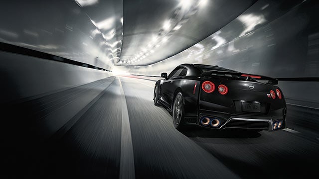 2023 Nissan GT-R seen from behind driving through a tunnel | DeLand Nissan in DeLand FL
